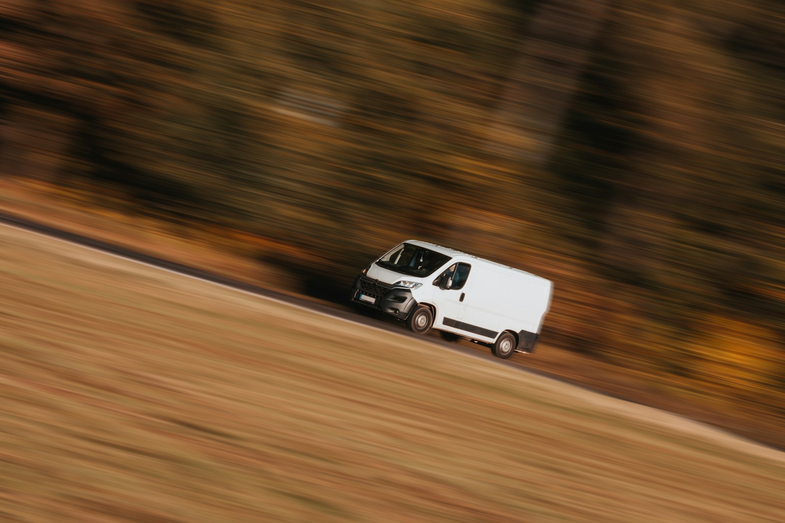 White delivery vehicle on the road